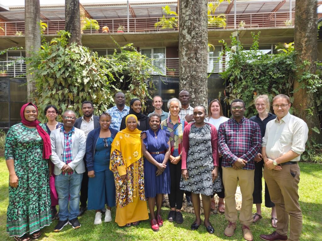 MCCRA team photo in a garden in Kampala