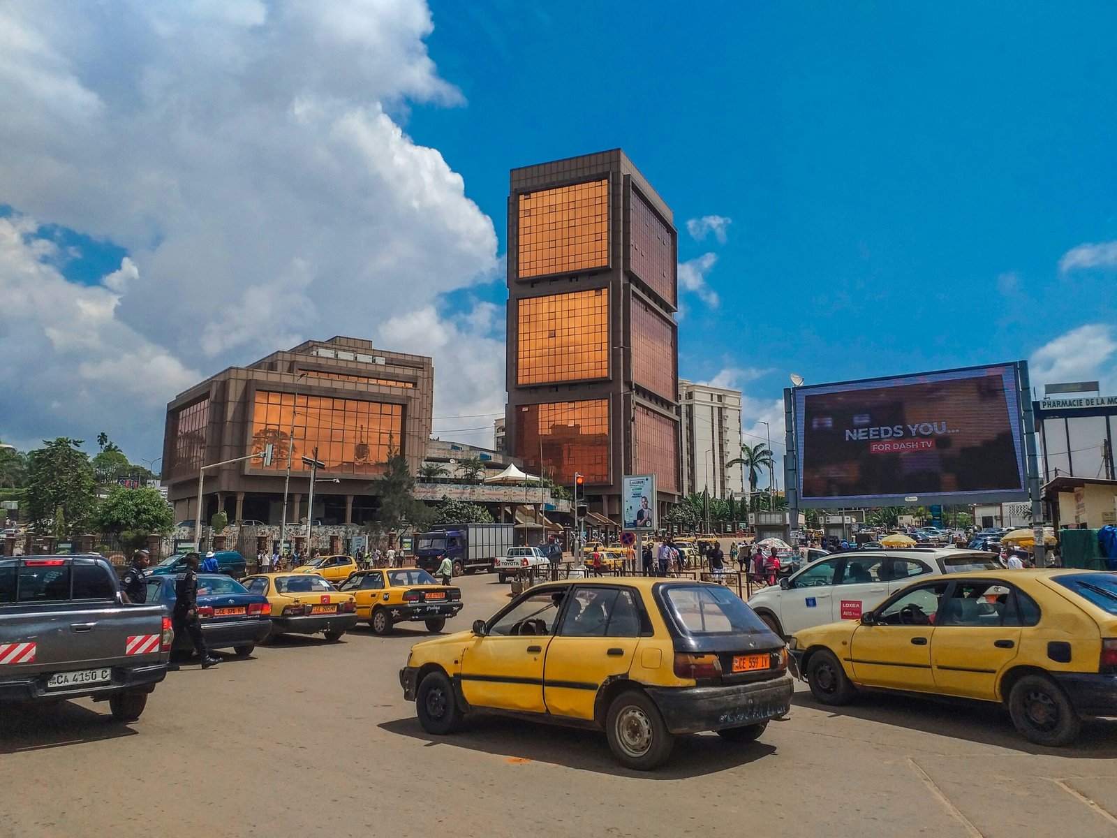 Street in Cameroon with taxis and cars