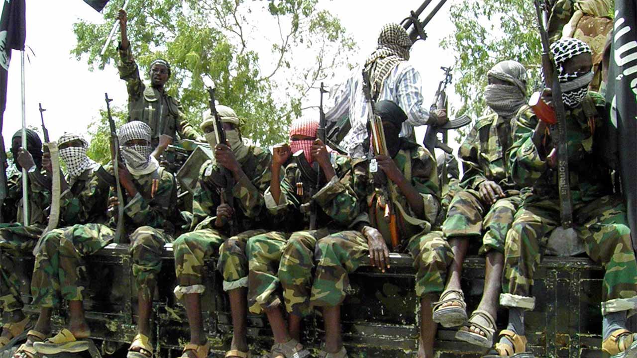 Image of Boko Haram militants sitting in a row